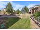 Landscaped backyard with patio and grassy area at 10215 W Wesley Dr, Lakewood, CO 80227