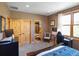Bedroom with en-suite bathroom and home office space at 10215 W Wesley Dr, Lakewood, CO 80227