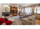 Living room features comfortable seating, a fireplace, and built-in shelving at 10215 W Wesley Dr, Lakewood, CO 80227