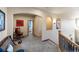 Upstairs hallway with seating area and access to bedrooms at 10215 W Wesley Dr, Lakewood, CO 80227