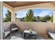 Covered balcony with mountain views and comfortable seating at 10215 W Wesley Dr, Lakewood, CO 80227