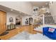 Two-story entryway with hardwood floors and open staircase at 10215 W Wesley Dr, Lakewood, CO 80227