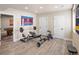 Basement home gym with weight bench and rack, providing a space for fitness at 10215 W Wesley Dr, Lakewood, CO 80227