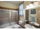 Clean bathroom with shower/tub combo and updated vanity at 10215 W Wesley Dr, Lakewood, CO 80227