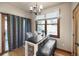Bright breakfast nook with table, bench seating, and backyard access at 10215 W Wesley Dr, Lakewood, CO 80227