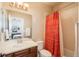 Clean bathroom with a shower/tub combo and updated vanity at 22435 Boundstone Dr, Parker, CO 80138