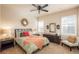 Bright bedroom with a comfortable bed and plenty of natural light at 22435 Boundstone Dr, Parker, CO 80138