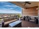 Relaxing deck with furniture, offering scenic views at 22435 Boundstone Dr, Parker, CO 80138