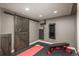 Basement home gym with equipment and plenty of space at 22435 Boundstone Dr, Parker, CO 80138