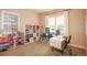 Convenient upstairs office space with built-in shelving and desk at 22435 Boundstone Dr, Parker, CO 80138