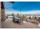 Outdoor patio with dining and seating areas, fire pit at 22435 Boundstone Dr, Parker, CO 80138