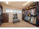 Spacious walk-in closet with ample shelving and hanging space at 22435 Boundstone Dr, Parker, CO 80138
