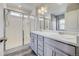 Bathroom with double vanity and a shower at 3356 Ireland Moss St, Castle Rock, CO 80109