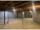 Unfinished basement with high ceilings and ample storage space at 3082 S Florence Ct, Denver, CO 80231