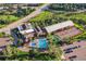 Aerial view of community pool, tennis courts, and clubhouse at 9451 Garden Ct, Highlands Ranch, CO 80126