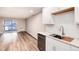 Modern kitchen with stainless steel appliances and white cabinets at 3144 S Wheeling Way # 107, Aurora, CO 80014