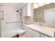 Updated bathroom with a tub, shower, and modern vanity at 3144 S Wheeling Way # 107, Aurora, CO 80014