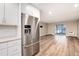 Modern kitchen with stainless steel appliances and white cabinets at 3144 S Wheeling Way # 107, Aurora, CO 80014