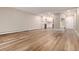 Bright living room with laminate floors and an open concept kitchen at 3144 S Wheeling Way # 107, Aurora, CO 80014