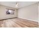 Bright bedroom with ceiling fan and window at 3144 S Wheeling Way # 107, Aurora, CO 80014