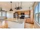 Island kitchen with granite countertops and modern cabinetry at 11248 Uptown Ave, Broomfield, CO 80021