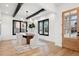 Modern dining room with hardwood floors and large windows at 457 S Vine St, Denver, CO 80209