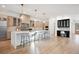 Open concept kitchen features a large island, custom cabinetry, and breakfast nook at 457 S Vine St, Denver, CO 80209