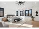 Bright and airy main bedroom with hardwood floors and large windows at 457 S Vine St, Denver, CO 80209