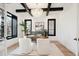 Home office with hardwood floors and built-in shelving at 457 S Vine St, Denver, CO 80209