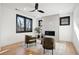 Sitting room with fireplace and two armchairs, offering a cozy and relaxing space at 457 S Vine St, Denver, CO 80209