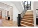 Elegant staircase with dark wood and metal railing at 457 S Vine St, Denver, CO 80209