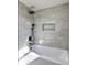 Updated bathroom with a walk-in shower and modern tile at 15360 W 44Th Ave, Golden, CO 80403