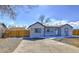 Newly remodeled home with a large yard and driveway at 15360 W 44Th Ave, Golden, CO 80403