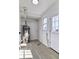 Laundry room with tile floor, water heater, and exterior access at 15360 W 44Th Ave, Golden, CO 80403
