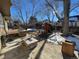 Large backyard with playset, fire pit, and deck at 21064 E Crestline Cir, Centennial, CO 80015