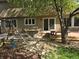 Patio area with built-in grill, and access to backyard at 21064 E Crestline Cir, Centennial, CO 80015