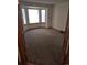 Bright office features a large bay window and plush carpeting at 21064 E Crestline Cir, Centennial, CO 80015