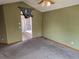 Main bedroom with carpet flooring and access to en-suite bathroom at 21064 E Crestline Cir, Centennial, CO 80015