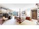 Spacious bedroom with a cozy fireplace and mountain views at 6301 Perry Park Blvd # 13, Larkspur, CO 80118