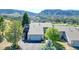 Aerial view of townhouse with mountain backdrop at 6301 Perry Park Blvd # 13, Larkspur, CO 80118