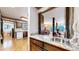 Kitchen boasts granite countertops and ample cabinetry at 6301 Perry Park Blvd # 13, Larkspur, CO 80118