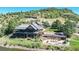Community clubhouse with pool and patio area at 6301 Perry Park Blvd # 13, Larkspur, CO 80118