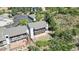Aerial view of property, highlighting its deck and landscaping at 6301 Perry Park Blvd # 13, Larkspur, CO 80118