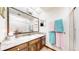 Bathroom with granite countertop and double sink at 6301 Perry Park Blvd # 13, Larkspur, CO 80118