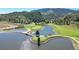 Golf course with water features and scenic landscape at 6301 Perry Park Blvd # 13, Larkspur, CO 80118