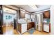 Galley kitchen with stainless steel appliances and granite counters at 6301 Perry Park Blvd # 13, Larkspur, CO 80118