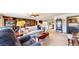 Living room features stone fireplace and built-in shelving at 6301 Perry Park Blvd # 13, Larkspur, CO 80118