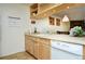 Bright kitchen features light wood cabinets, and modern appliances at 1001 Grandview Dr # 24, Breckenridge, CO 80424