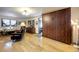 Main bedroom with a murphy bed and hardwood floors at 5673 Santa Clara Rd, Indian Hills, CO 80454