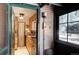 Cozy kitchen with wood cabinets, granite counters, and a vintage stove at 5673 Santa Clara Rd, Indian Hills, CO 80454
